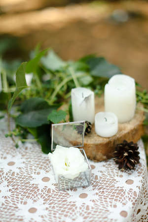Little box for wedding rings on handmade altar.の写真素材