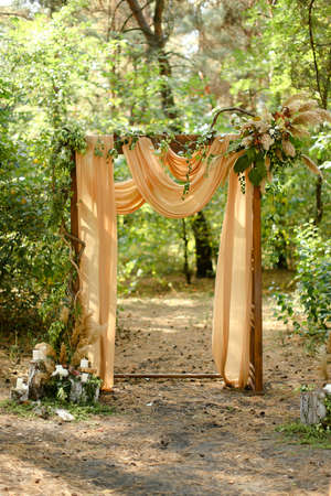 Yellow wedding altar in forest.の写真素材