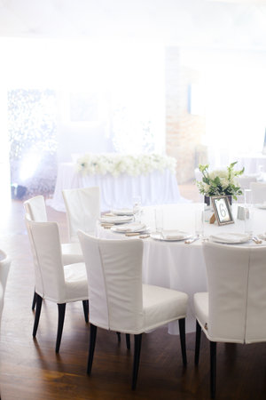 Wedding banquet table at cafe with number six.の写真素材