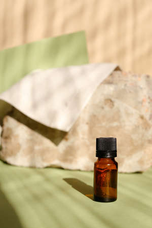 Eco friendly Bottles and jars with natural skincare cosmetics, creams or oils on light background. Plant-based beauty productsの写真素材