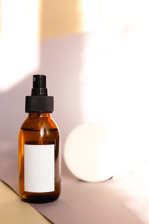 Eco friendly Bottle or jar with natural skincare cosmetics, creams or oils on light background. Plant-based beauty productsの写真素材