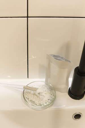 white powder dry clay mask. Cosmetic texture for face and body. Selective focus.の写真素材