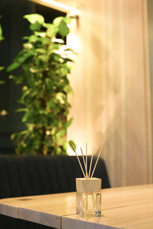 Herbal and oil treatment equipment in relaxing spa scene.