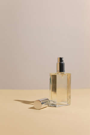 perfume bottle on the neutral modern backgroundの写真素材