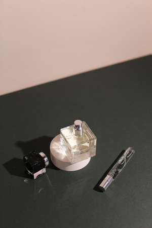 perfume bottle on the neutral modern backgroundの写真素材