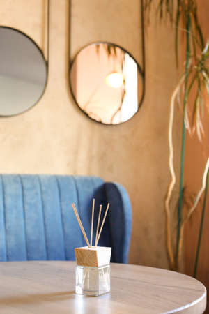 Aromatherapy reed diffuser air freshener on relaxed spa backgroundの写真素材