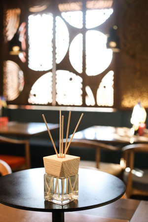Aromatherapy reed diffuser air freshener on relaxed spa backgroundの写真素材