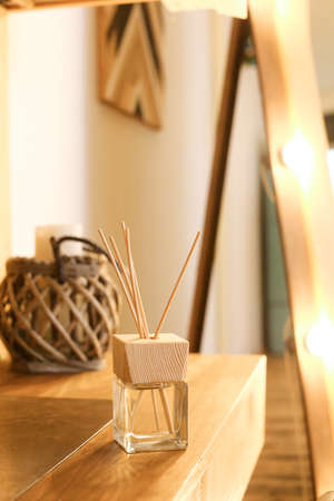 Aromatherapy reed diffuser air freshener on relaxed spa backgroundの写真素材