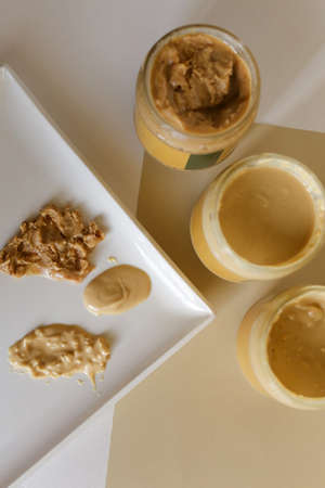 Peanut or Almond Butter in jarの写真素材