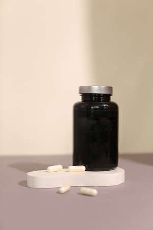 dietary supplements on neutral background