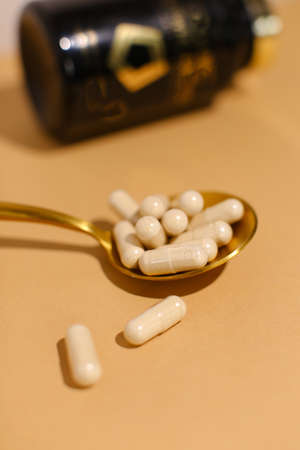dietary supplements on neutral background