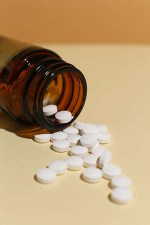 dietary supplements on neutral background
