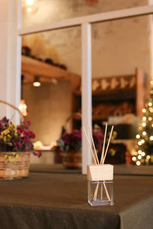 Aromatherapy reed diffuser air freshener on relaxed spa backgroundの写真素材