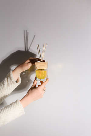 Aromatherapy reed diffuser air freshener on relaxed spa backgroundの写真素材