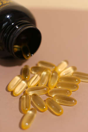 omega fish oil dietary supplements on neutral backgroundの写真素材
