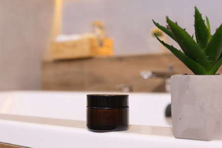 Natural skincare cosmetics, creams and oils on bath background. Plant-based beauty products.の写真素材