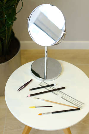 Set of professional cosmetic: make-up brushes, lipstick and brow pencilの写真素材