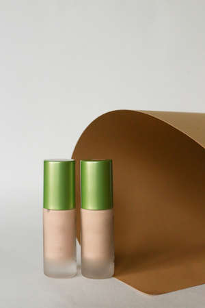 Foundation face make-up samples. Set of cosmetic liquid foundation or bb cream in bottle colour. Make up smears isolated on a white backgroundの写真素材