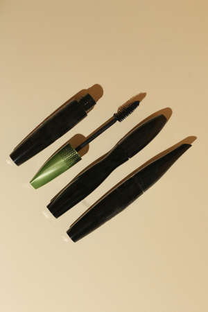 Isolated mascara on neutral backfround. Open with brush, black. Focus on brushの写真素材