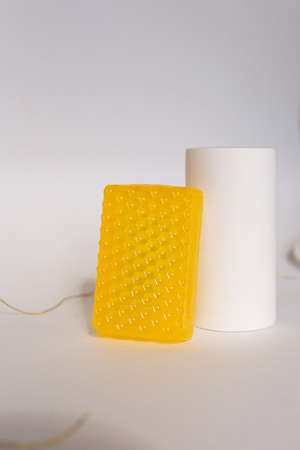 bars of natural soap with dried herbsの写真素材