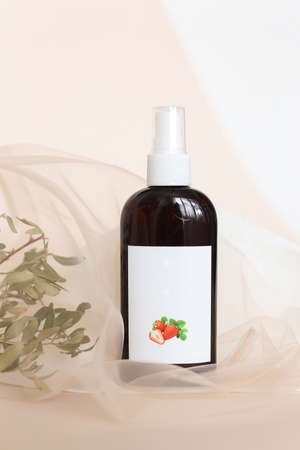 Eco friendly Bottle or jar with natural skincare cosmetics, creams or oils on light background. Plant-based beauty productsの写真素材