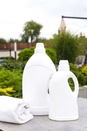 Softener bottle plastic bottle with liquid laundry detergent, cleaning agent, bleach or fabric softenerの写真素材