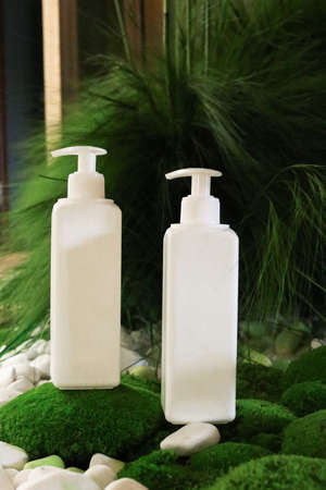 White Plastic dispenser bottles with body creamの写真素材