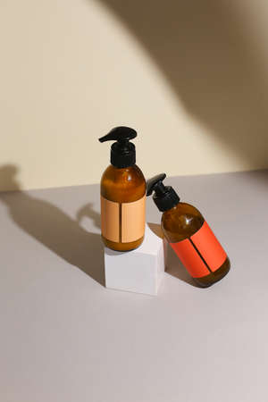 Plastic dispenser bottles with body creamの写真素材