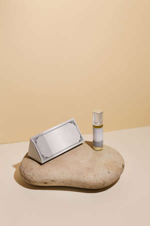 perfume bottle on the neutral modern backgroundの写真素材