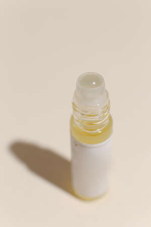 perfume bottle on the neutral modern backgroundの写真素材
