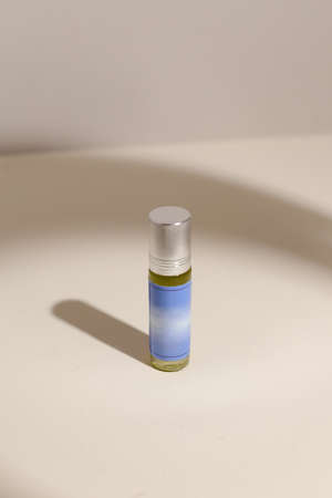 perfume bottle on the neutral modern backgroundの写真素材