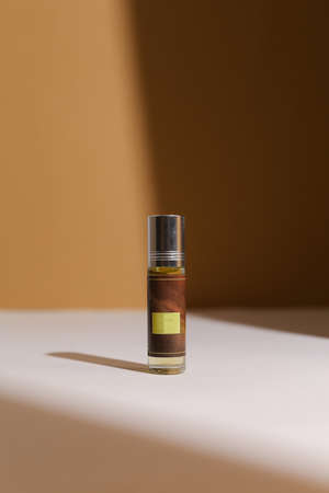 perfume bottle on the neutral modern backgroundの写真素材