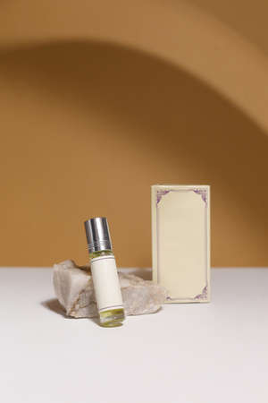 perfume bottle on the neutral modern backgroundの写真素材