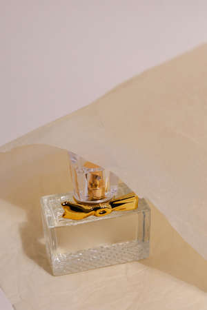 perfume bottle on the neutral modern backgroundの写真素材