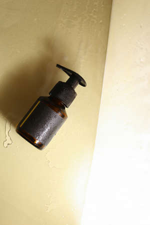 Plastic dispenser jar with body creamの写真素材