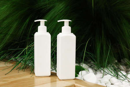 White Plastic dispenser bottles with body creamの写真素材