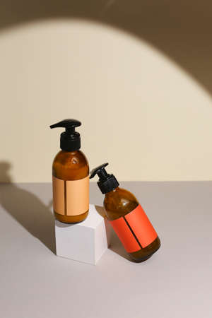 Plastic dispenser bottles with body creamの写真素材