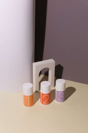 Skincare routine 1 2 3 step for healthy skin - serum, lotion or eye cream packaging. Beauty and cosmetic concept. Copy space.の写真素材