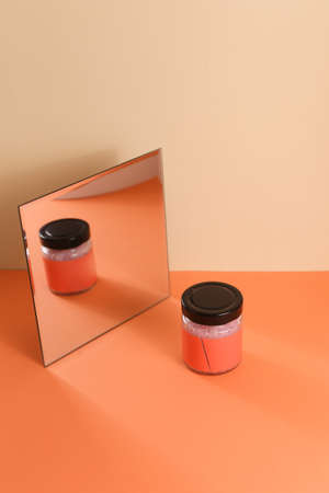 Set of cosmetic glass bottle with mirror. Closeup, copyspace. Beauty blogging, salon treatment concept, minimalism brand packaging mock upの写真素材