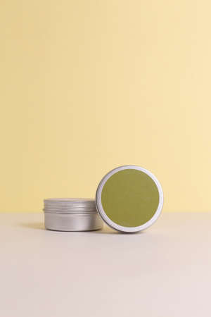 Aluminum round jar for cosmetics. Metalic cosmetic bottles. Blank mock up advertising container with copy space.の写真素材