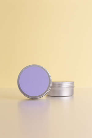 Aluminum round jar for cosmetics. Metalic cosmetic bottles. Blank mock up advertising container with copy space.の写真素材