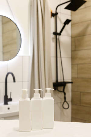 White Plastic dispenser bottles with body creamの写真素材