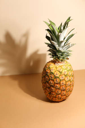 Pineapple isolated on neutral beige background