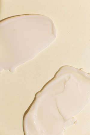 Cosmetic cream texture on neutral background