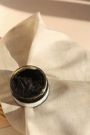 Body scrub of honey sugar peeling. Neutral Background.