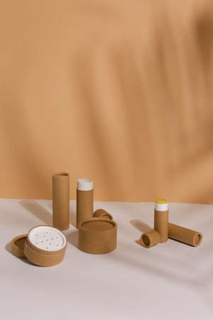 Recyclable paper tube with paper cap, cardboard container for packaging isolated on white background...