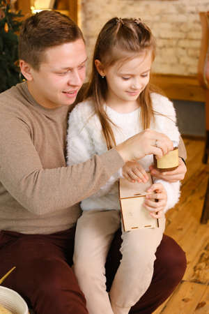 Dad and daughter enjoy peanut or almond butter, peanut butter sandwichの写真素材