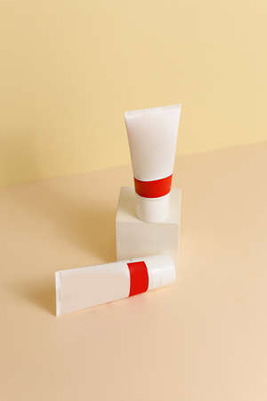 Eco friendly Bottle and tube with natural skincare cosmetics, creams or oils on light background. Plant-based beauty productsの写真素材