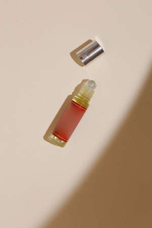 perfume bottle on the neutral modern backgroundの写真素材
