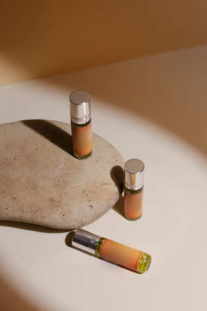perfume bottle on the neutral modern backgroundの写真素材